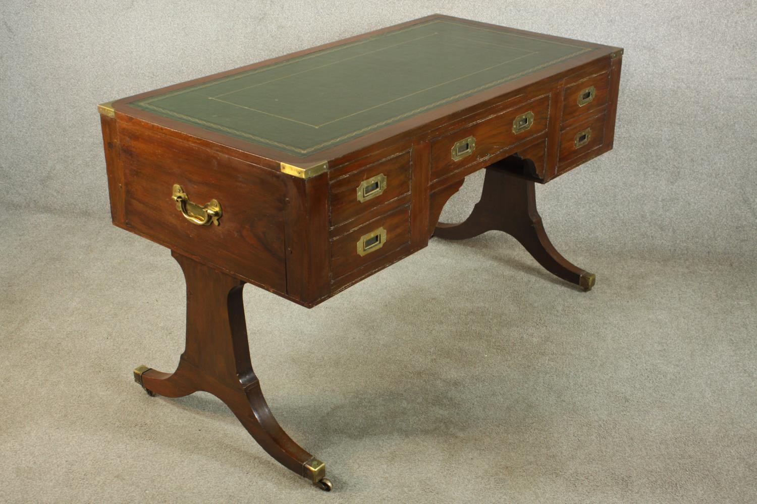A contemporary mahogany Chinese style leather inset writing table with brass campaign style - Image 10 of 12