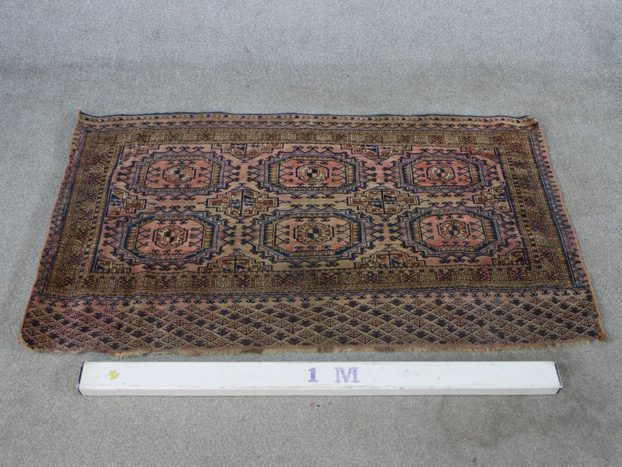 A Tekke Turkmen Juval rug woven with pink and brown fabric. L.73 W.130cm. - Image 2 of 5