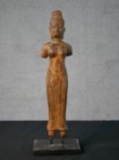 A bronze effect ceramic Khmer style figure of Vishnu on stand. H.45.5 W.15 D.10.5cm