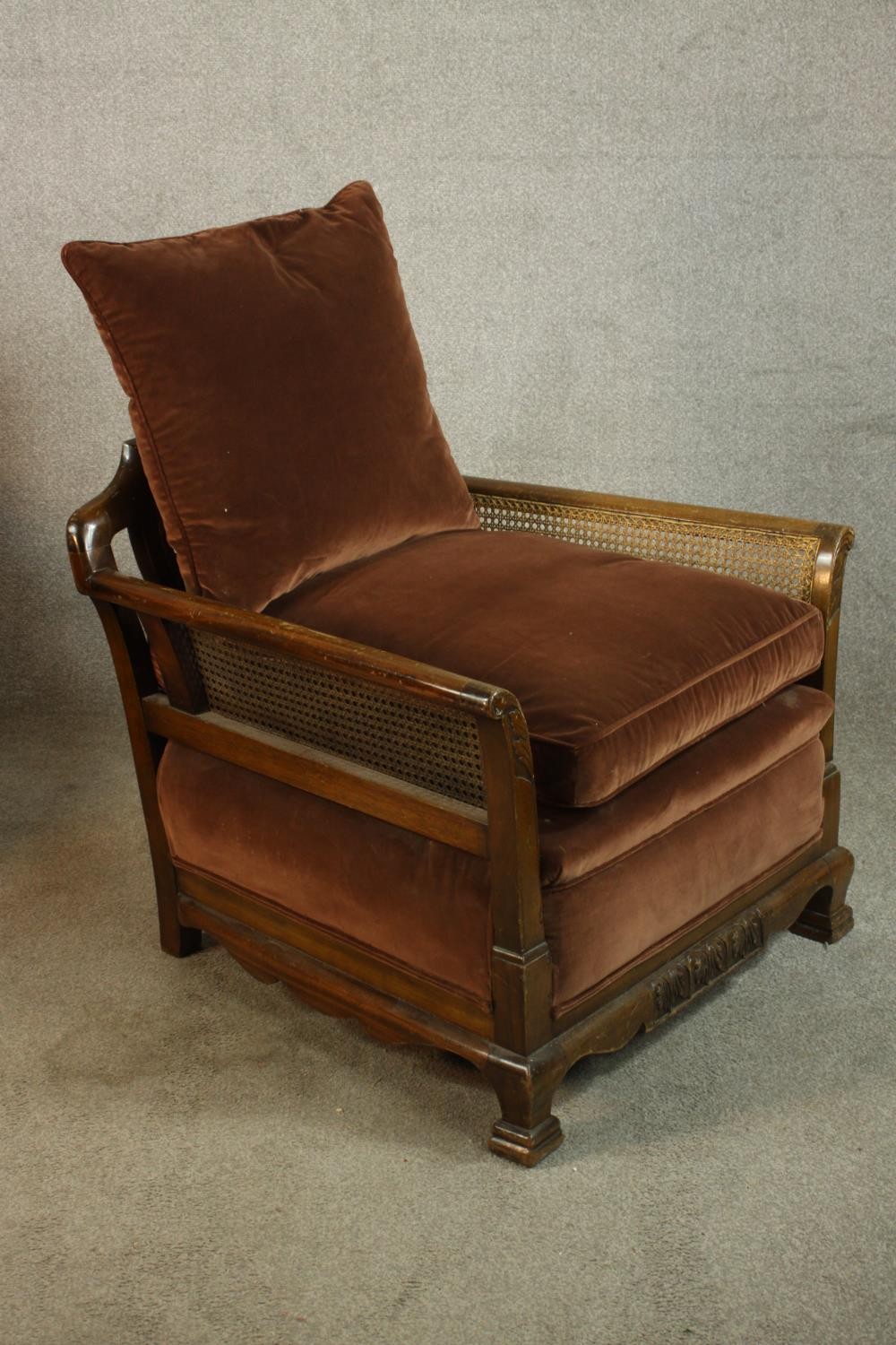 A pair of early 20th century carved mahogany framed and bergère armchairs, each with scroll arms and - Image 5 of 9