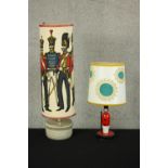 A carved and painted wooden lampbase in the form of a solider together with a mid 20th century