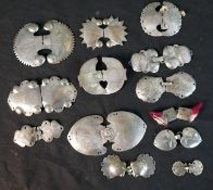 A collection of thirteen engraved white metal and silver 18th and 19th century style Danish