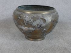 An early 20th century Japanese mixed metal jardinere with applied naturalistic bird decoration. H.27