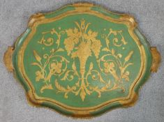 An early 20th century Indian engraved brass circular tray top folding table together with a