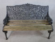A Victorian Coalbrookdale style cast iron garden bench, in nasturtium pattern, missing one seat