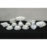 An assortment of Royal Copenhagen Blue fluted half lace pattern blue and white porcelain to