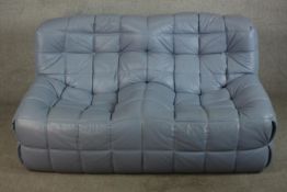 A late 20th century Togo blue leather two seater sofa designed by Michael Ducorary for Ligne