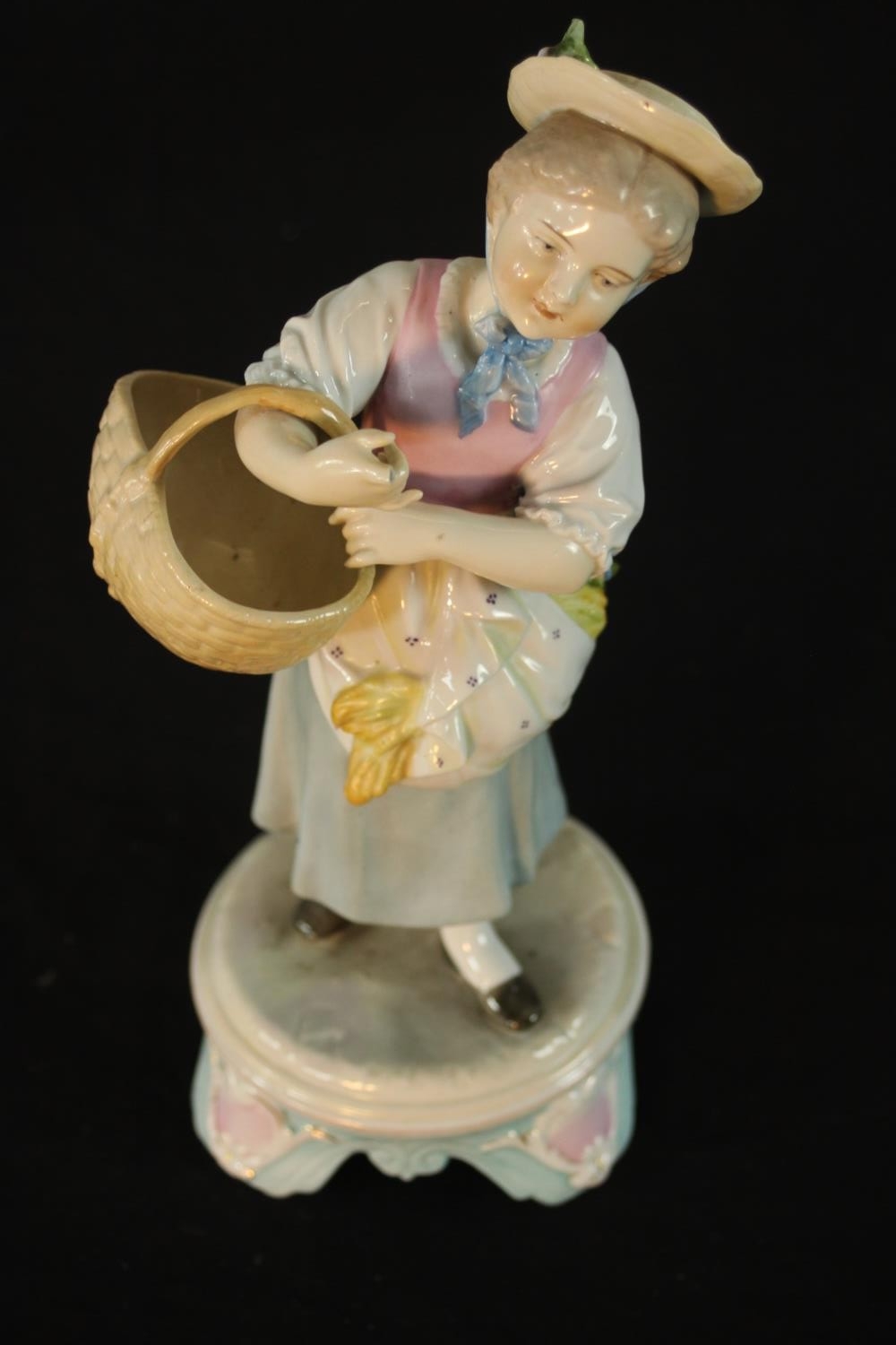 A pair of late 19th / early 20th century Continental porcelain figures of a man and a woman carrying - Image 12 of 12