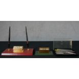 Assorted desk related items to include a brass and leather Art Deco perpectual calender, a brass Art