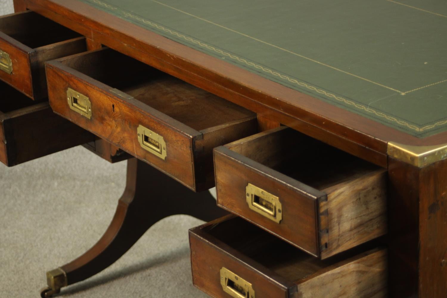 A contemporary mahogany Chinese style leather inset writing table with brass campaign style - Image 8 of 12