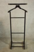 A 20th century painted gentlemens vanity stand. H.113 W.47 D.33cm.