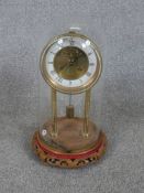 A 20th century Richard et Cie (Richard & Co) brass anniversary / mystery clock, the white and