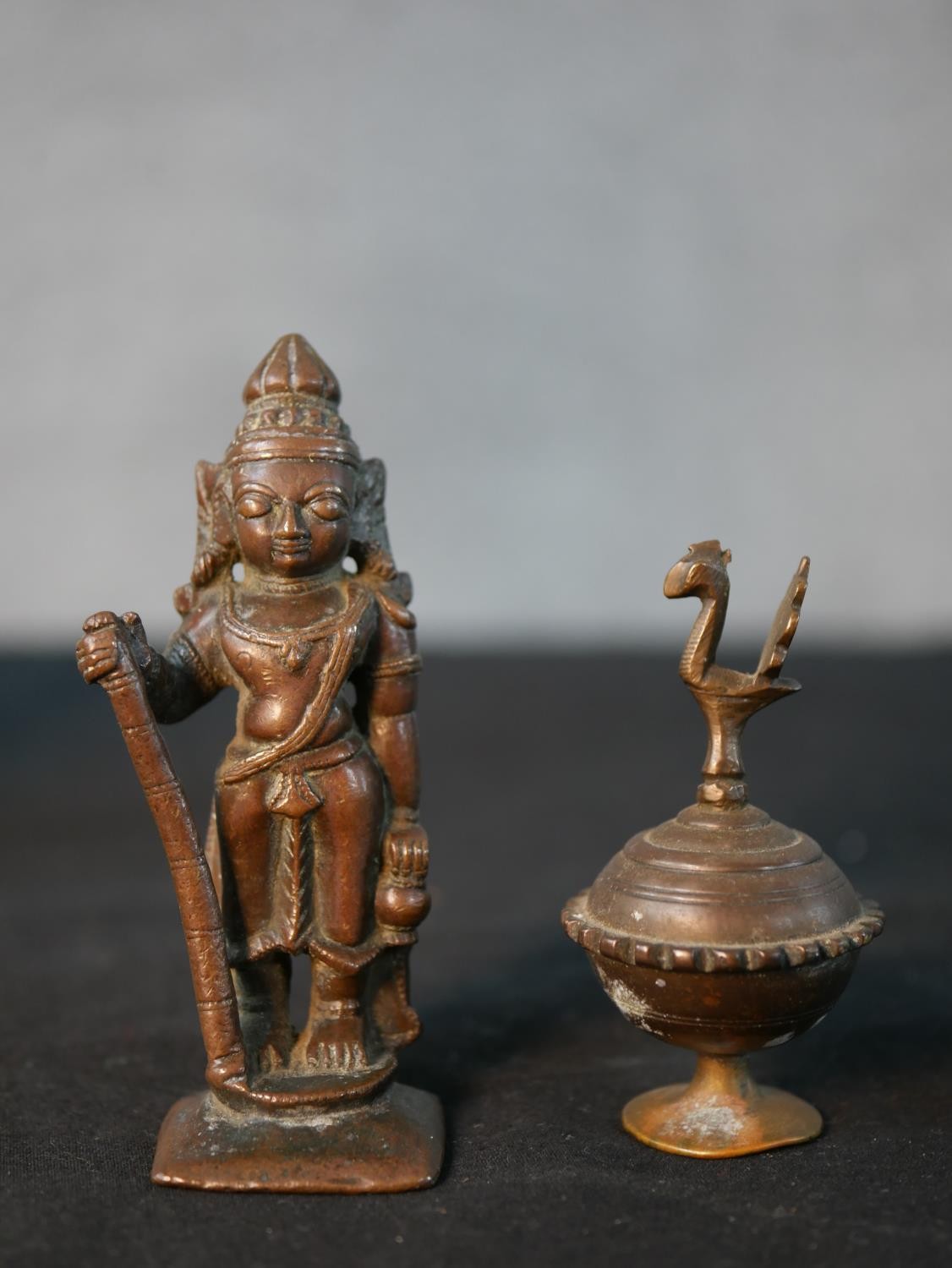 A collection of figures and boxes, including a bronze Indian deity, brass Buddha, carved hardwood - Image 2 of 13