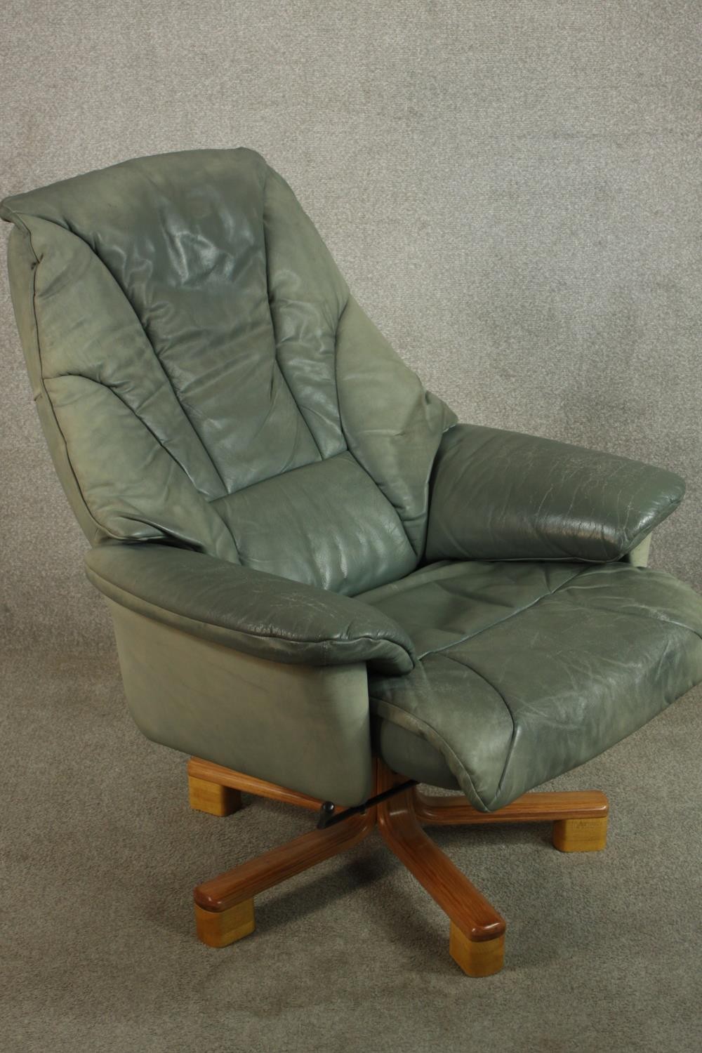 A 20th century pale green leather swival and counter leaver arm chair raised on five splayed - Image 3 of 8