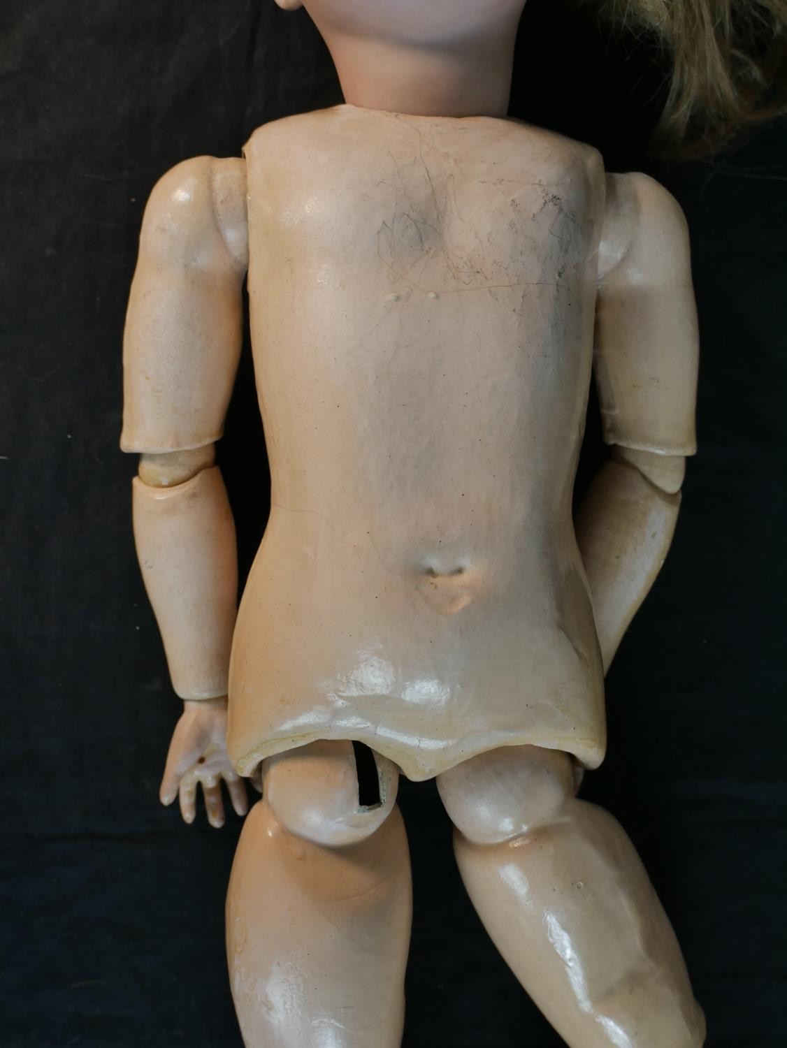 An early 20th century C. M. Bergmann bique porcelain headed composition articulated doll, - Image 4 of 7