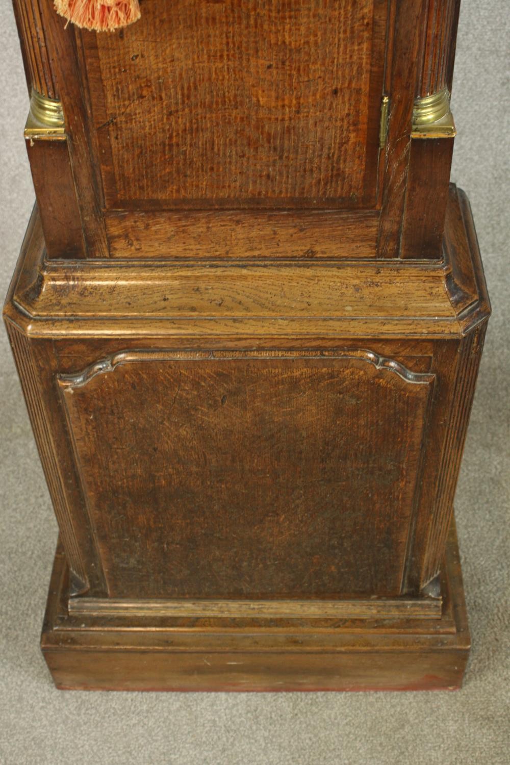 A 19th century oak cased longcase clock, with broken swan neck pediment and three brass finials - Image 9 of 11