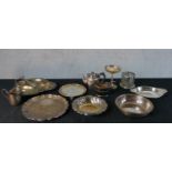 Assortment of silver plate to include dishes, plates, bottle coaster, teapot etc. H.8 W.28 D.27.