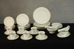 A Royal Tuscan 'Sovereign' part dinner set to include plates, cups and saucers and gravy boats.