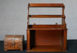 A late 19th century mahogany two shelf hanging bookcase with cupboard below together with a 19th