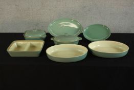 Seven assorted green painted Denby stoneware cooking dishes, comprising two oval lidded dishes and