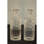 A pair of early 20th century cut glass rectangular decanters with mushroom shaped stoppers. H.27 W.9