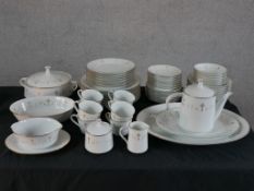 A 20th century Noriktake 'Courtney' pattern dinner set comprising of bowls, plates, cups, lidded