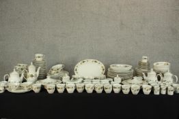 An extensive (over 100 pieces) Royal Doulton Larchmont dinner/tea service to include cups,
