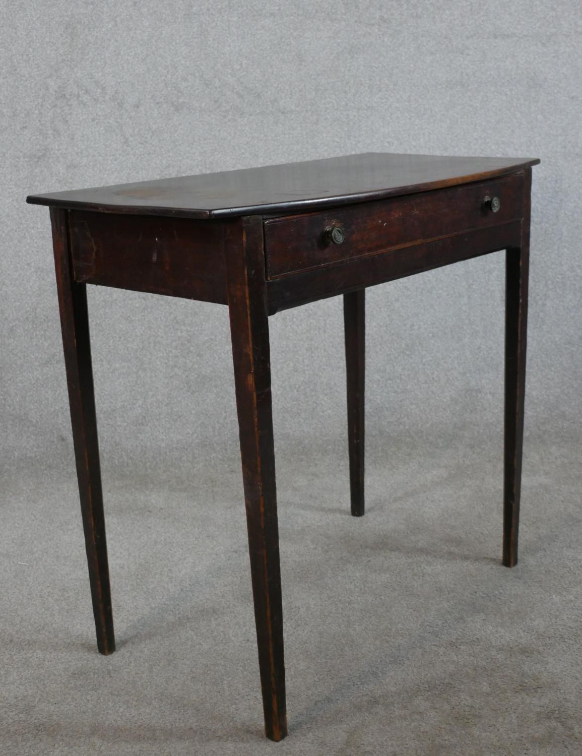 An 18th century mahogany bow fronted side table, with single long drawer on square tapering legs. - Image 5 of 5