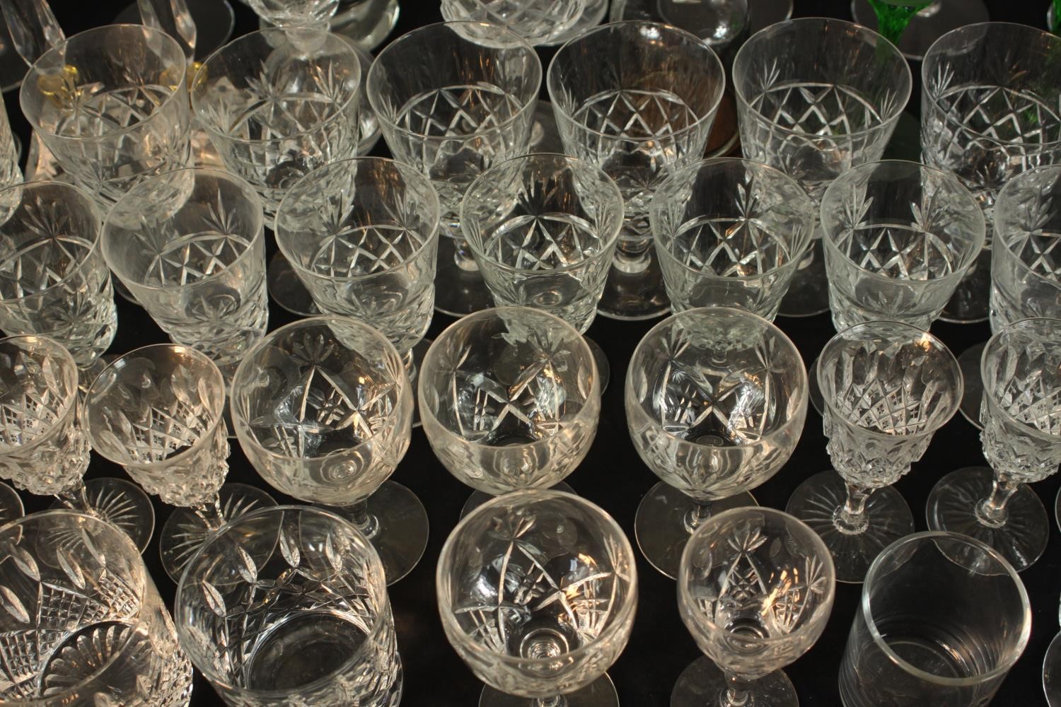 Aprroximately fifty mid / late 20th assorted cut glass drinking glasses together with decanters. H. - Image 6 of 9