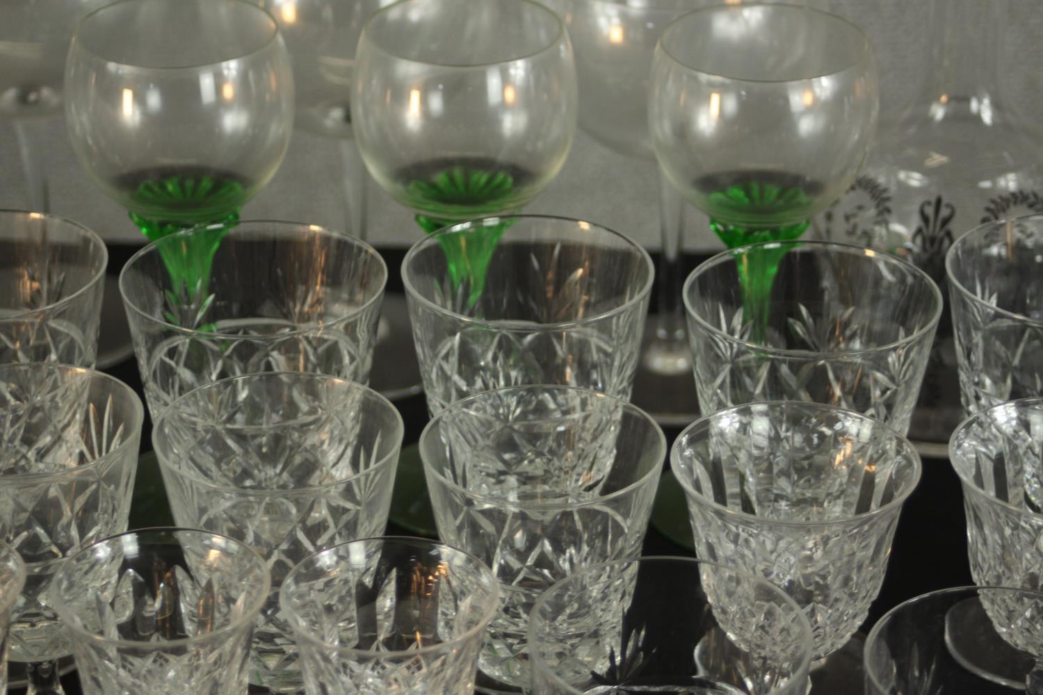 Aprroximately fifty mid / late 20th assorted cut glass drinking glasses together with decanters. H. - Image 4 of 9