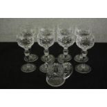 A set of eight Stuart Crystal cut glass wine glasses, together with similar design water jug, etched