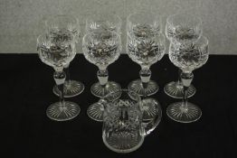 A set of eight Stuart Crystal cut glass wine glasses, together with similar design water jug, etched