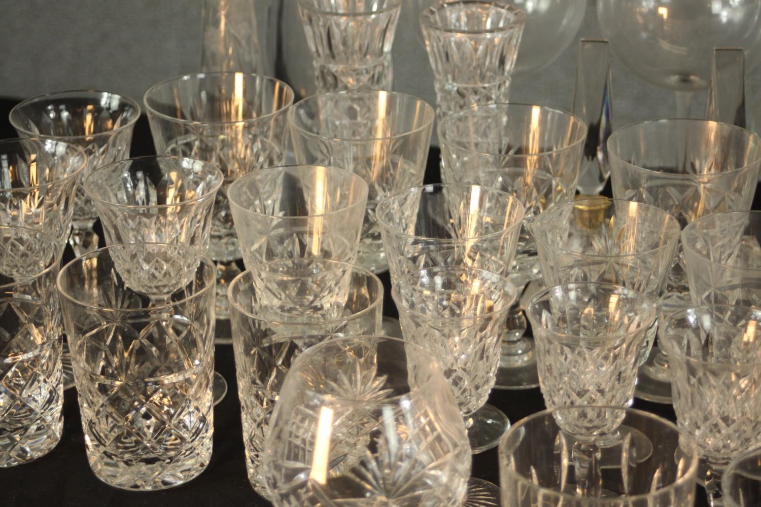 Aprroximately fifty mid / late 20th assorted cut glass drinking glasses together with decanters. H. - Image 3 of 9
