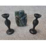A pair of 20th century ring turned hardwood candlesticks, with baluster stems and on circular