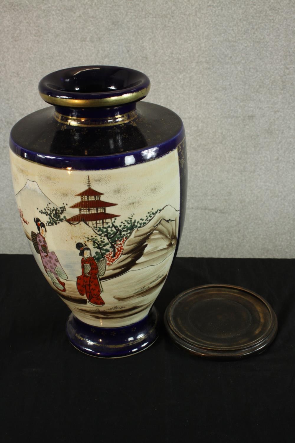 A mid Japanese Satsuma pottery vase, decorated with figures in a temple with Mount Fuji behind, - Image 6 of 6