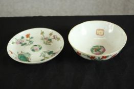 A Chinese porcelain bowl and saucer dish, decorated with panels of flowers, with seal mark, wax seal