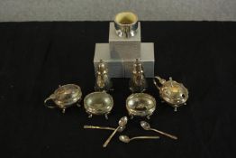 A Hong Kong silver cruet set and three boxed silver napkin rings. Stamped sterling. H.7 W.3 D.