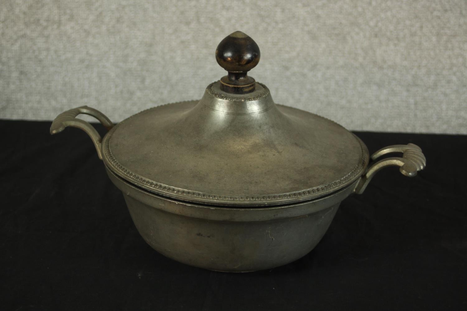 Three pieces of pewter comprising of pewter comprising of two chargers and a twin handled tureen and - Image 7 of 10