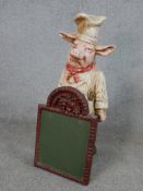 A vintage floor standing carved and painted novelty pig butchers shop display board. H.62 W.26 D.