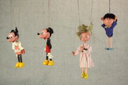 Two unboxed Pellham puppets comprising Mickey Mouse, Minnie Mouse, Girl in Stripy Dress & Florence