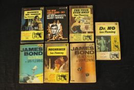 Ian Fleming, a set of a seven paperback novels, comprising of Dr. No, Goldfinger, Thunderball,