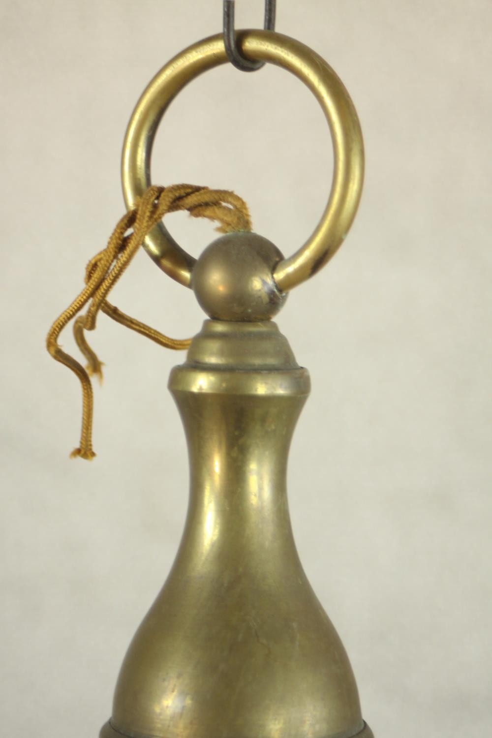 A 20th century Dutch style six branch brass chandelier with scroll arms. Damaged. H.70 Dia.42cm. - Image 7 of 8