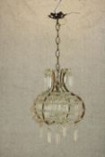 A late 19th/early 20th century Venitian glass and metal framed hanging chandelier. H.70 Dia. 36cm.