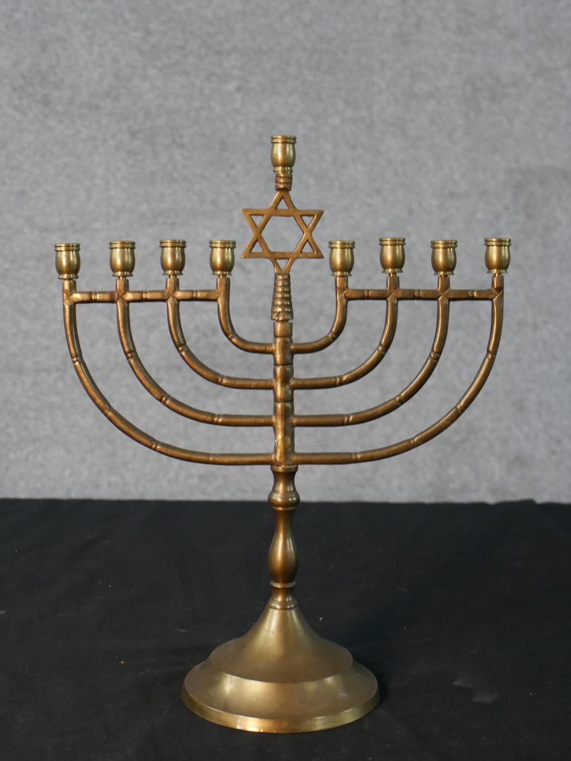 An assortment of brassware to include a menorah; set with central Star of David, a silver plated ' - Image 5 of 6
