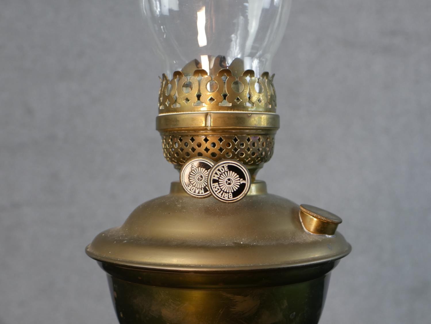 Three Victorian brass oil lamps, one with a spherical etched glass shade and a glass funnel, on an - Image 9 of 16