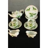 A 20th century Hammersley & Co two person breakfast set, decorated with flowers, marks to base. H.10