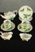 A 20th century Hammersley & Co two person breakfast set, decorated with flowers, marks to base. H.10