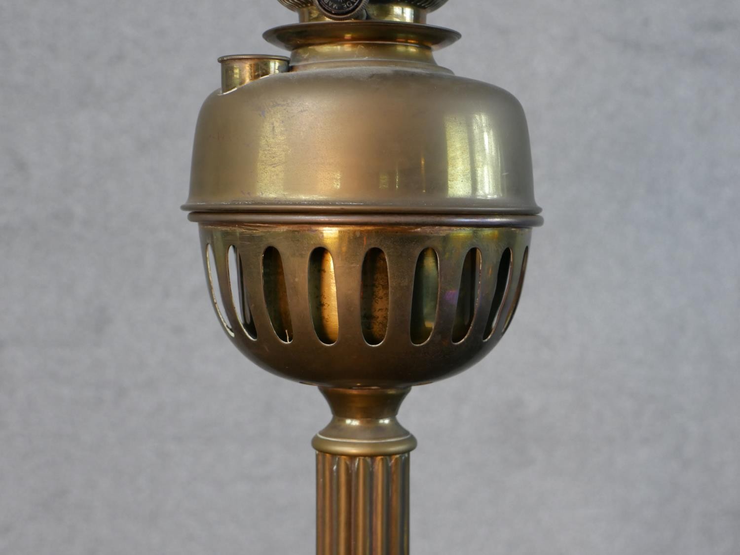 Three Victorian brass oil lamps, one with a spherical etched glass shade and a glass funnel, on an - Image 5 of 16
