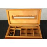 A 20th century mahogany and ceder lined humidor complete with associated cigar cutters. H.8 W.45 D.