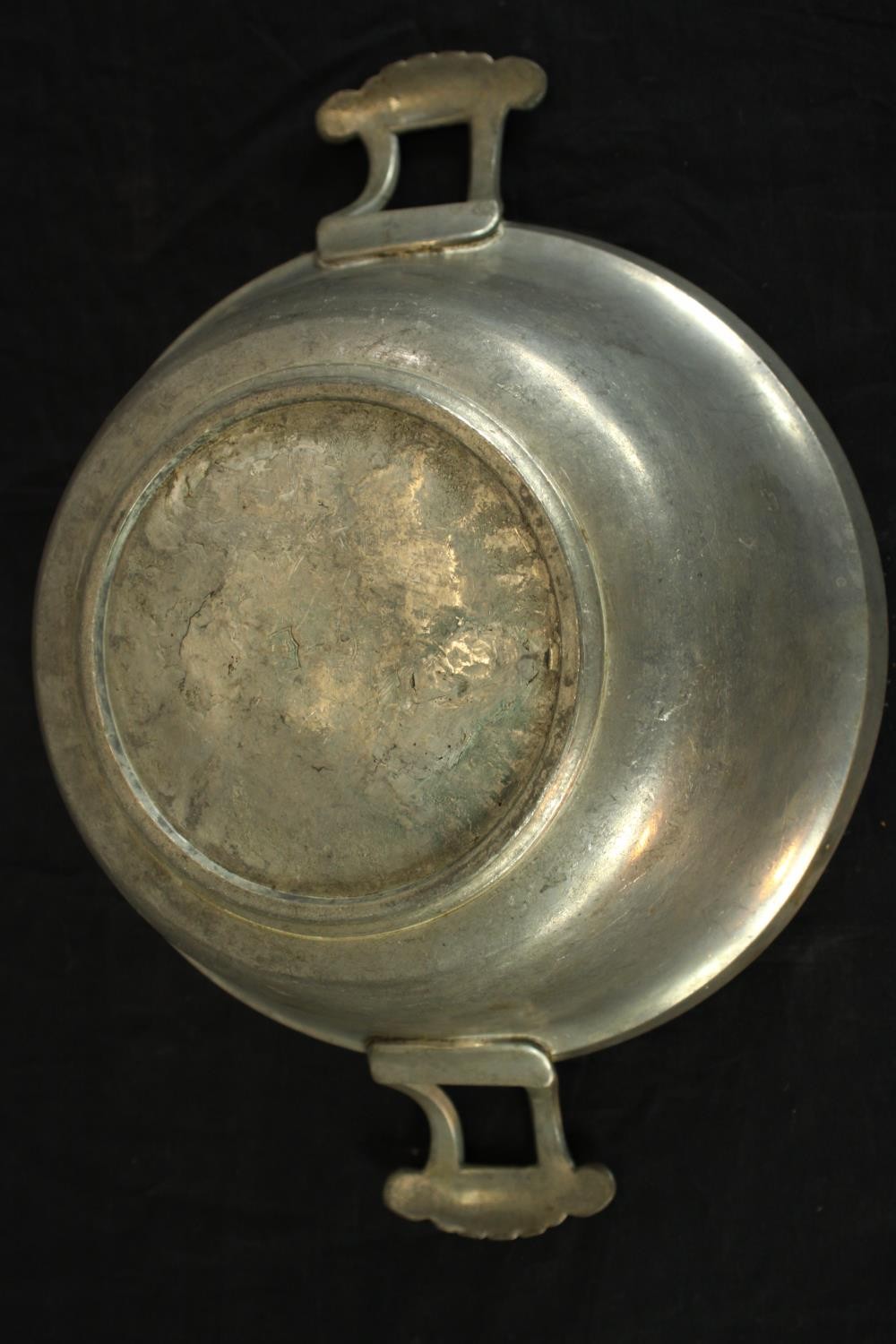 Three pieces of pewter comprising of pewter comprising of two chargers and a twin handled tureen and - Image 10 of 10